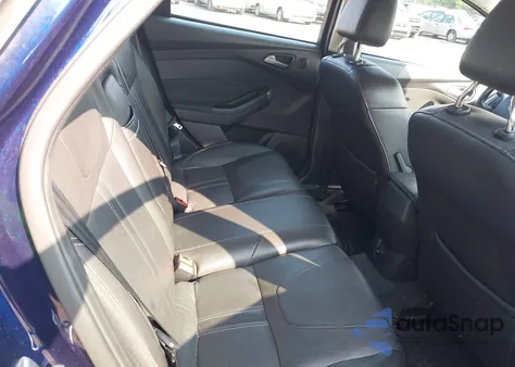 2012 Ford Focus Titanium z USA, uszkodzony, nr VIN 1FAHP3N23CL151465